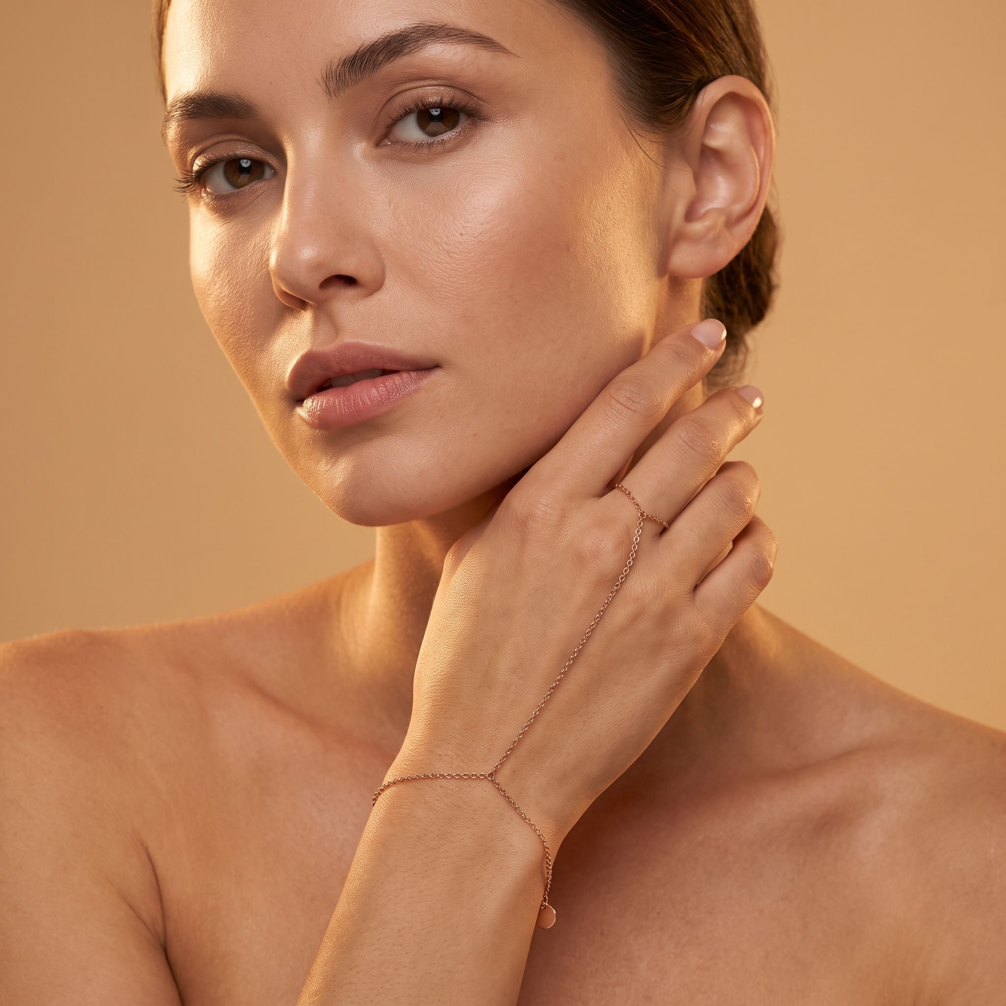 Lumière Rose Gold Hand Chain - worn, editorial