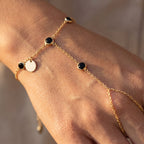 Rivière Onyx Hand Chain - detail on skin