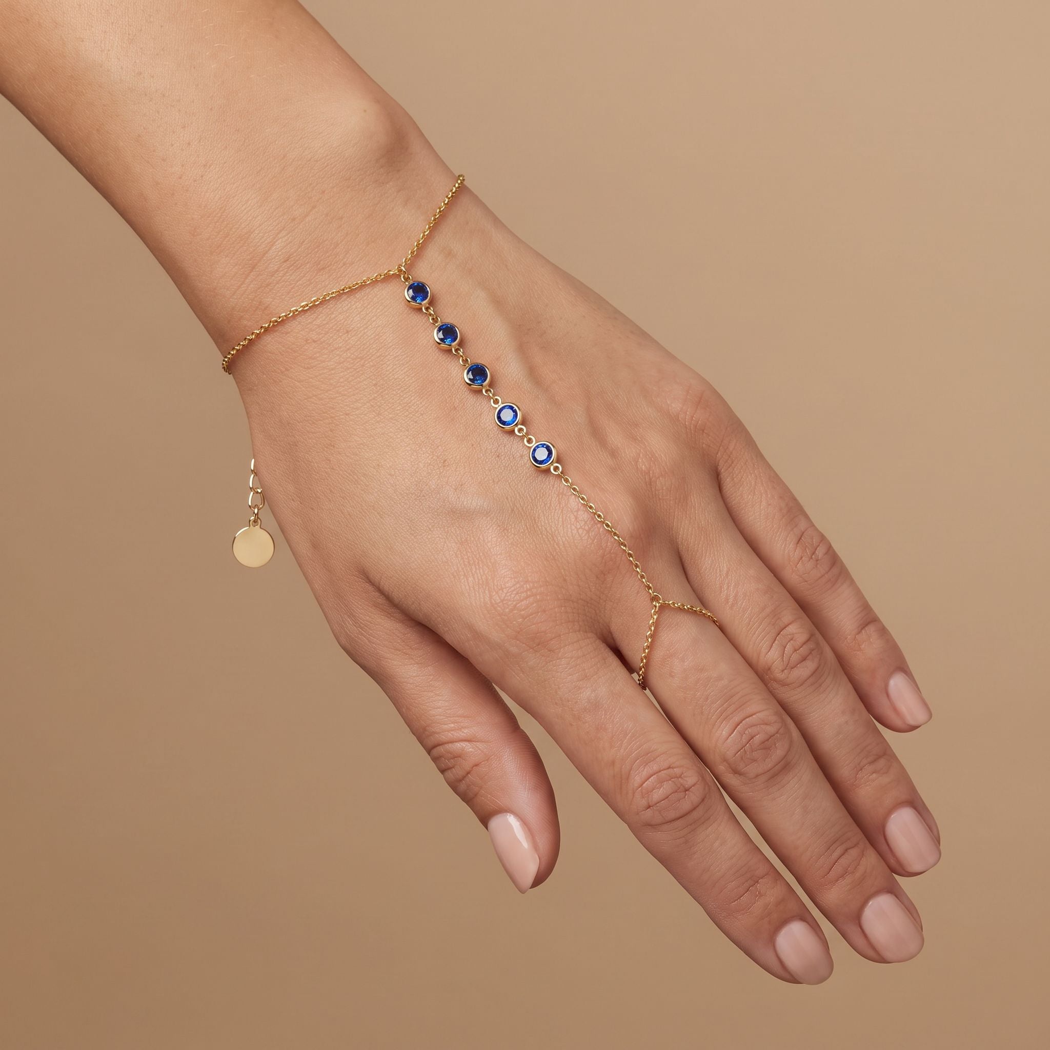 Étincelle Sapphire Hand Chain - worn on hand