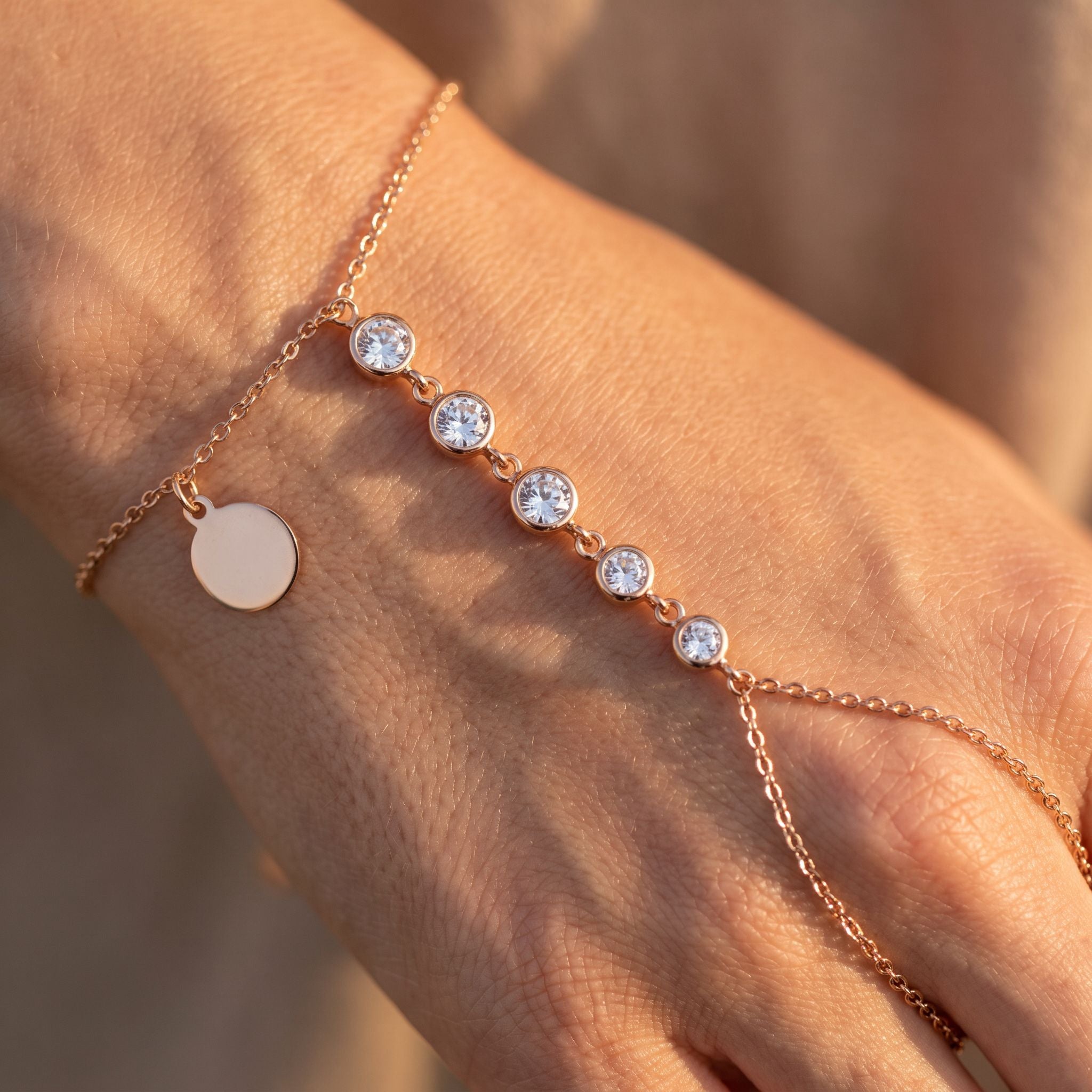 Étincelle Rose Gold Hand Chain - detail on skin
