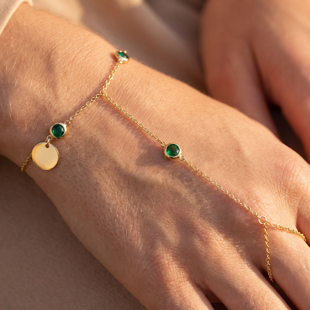Rivière Emerald Hand Chain - detail on skin