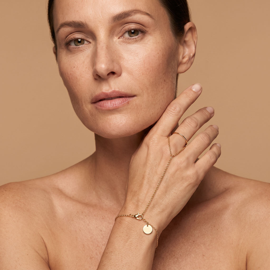 Lumière Gold Hand Chain - worn, editorial