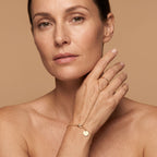 Lumière Gold Hand Chain - worn, editorial