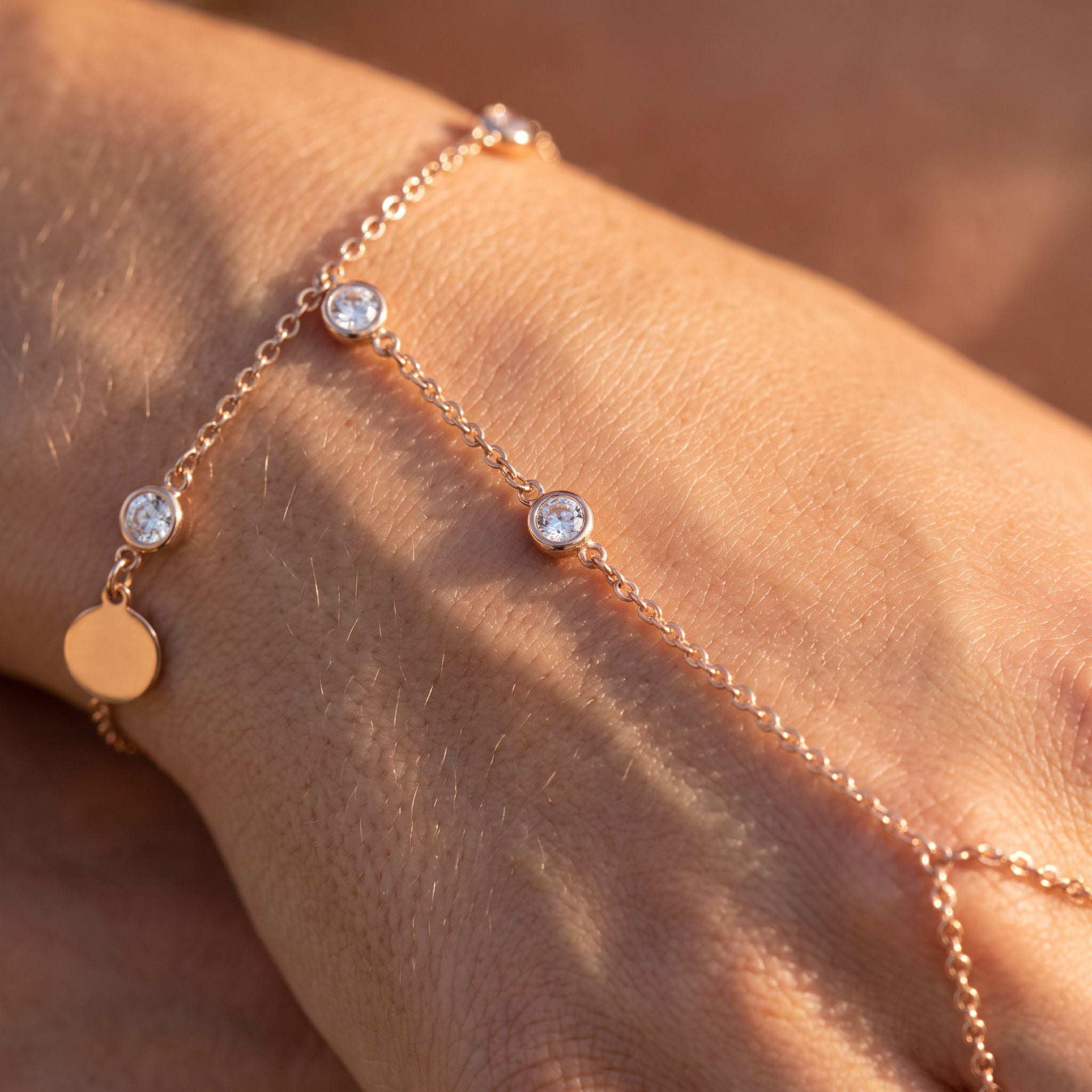 Rivière Rose Gold Hand Chain - detail on skin