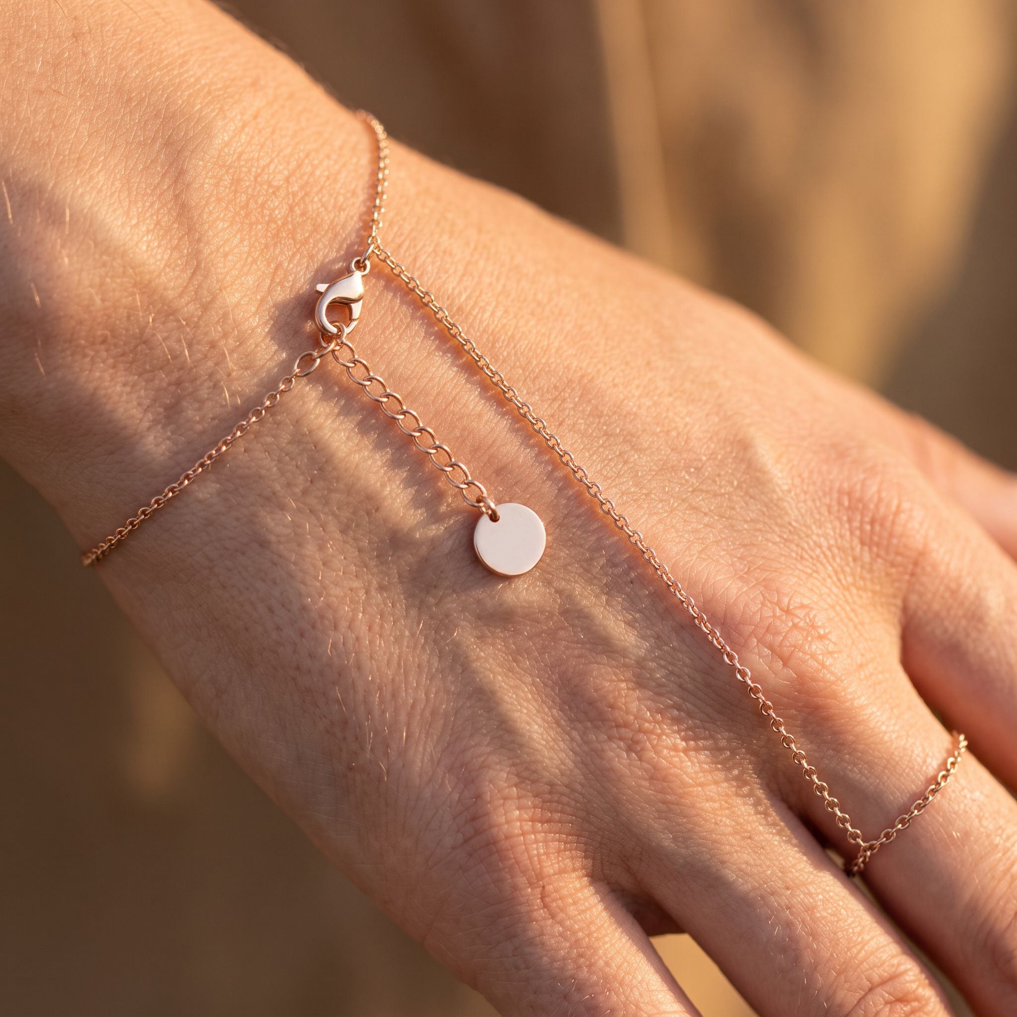 Lumière Rose Gold Hand Chain - detail on skin